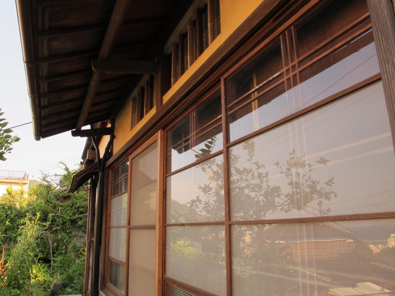 Отель Atami Ikyuan 熱海一休庵 Экстерьер фото